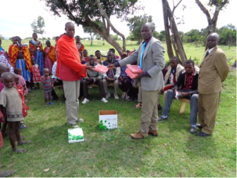 Giving away bibles in Kenya